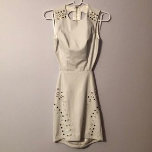 NWT white feaux leather Bebe mini